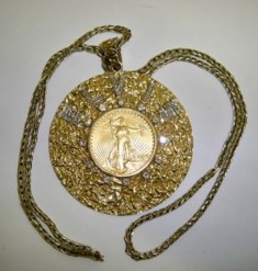 Elvis Presley auction - gold and diamond medallion